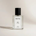 NOCTRASCENTSH 021 Kuala Lumpur extrait de parfum in a clear glass bottle with a black cap.