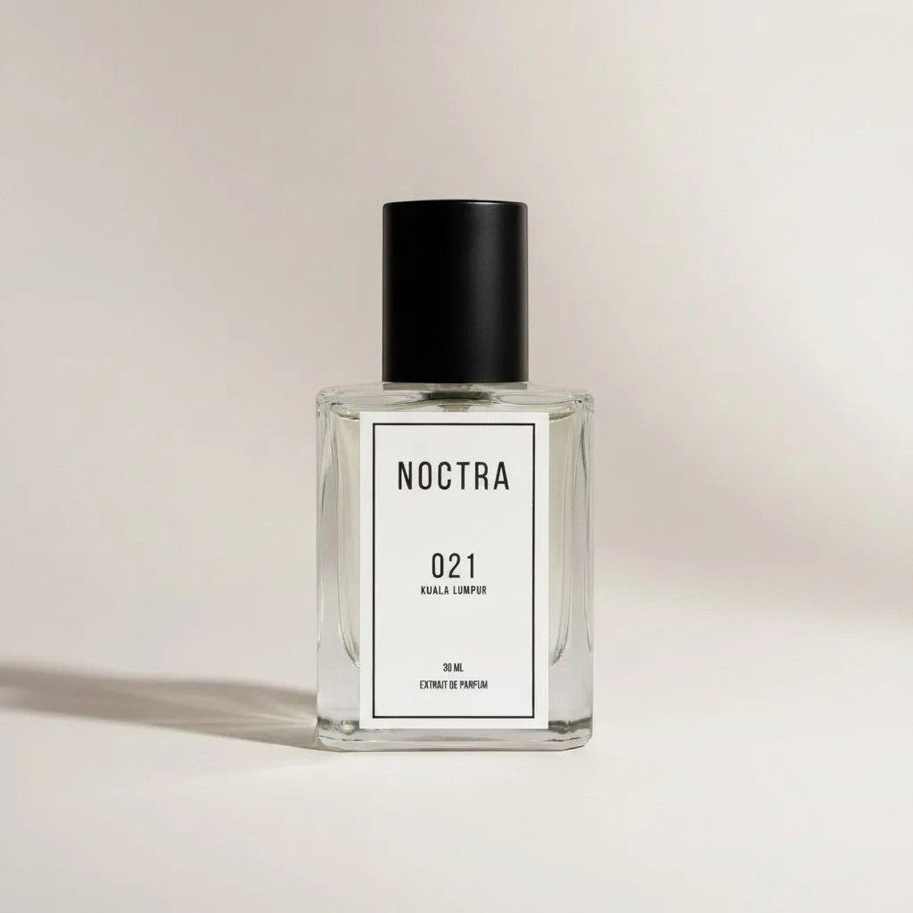 NOCTRASCENTSH 021 Kuala Lumpur extrait de parfum in a clear glass bottle with a black cap.