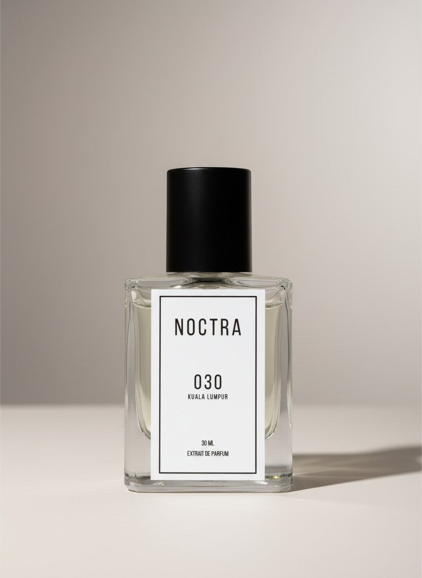 NOCTRASCENTS NOCTRA 030 Kuala Lumpur extrait de parfum in a clear glass bottle with a black cap.
